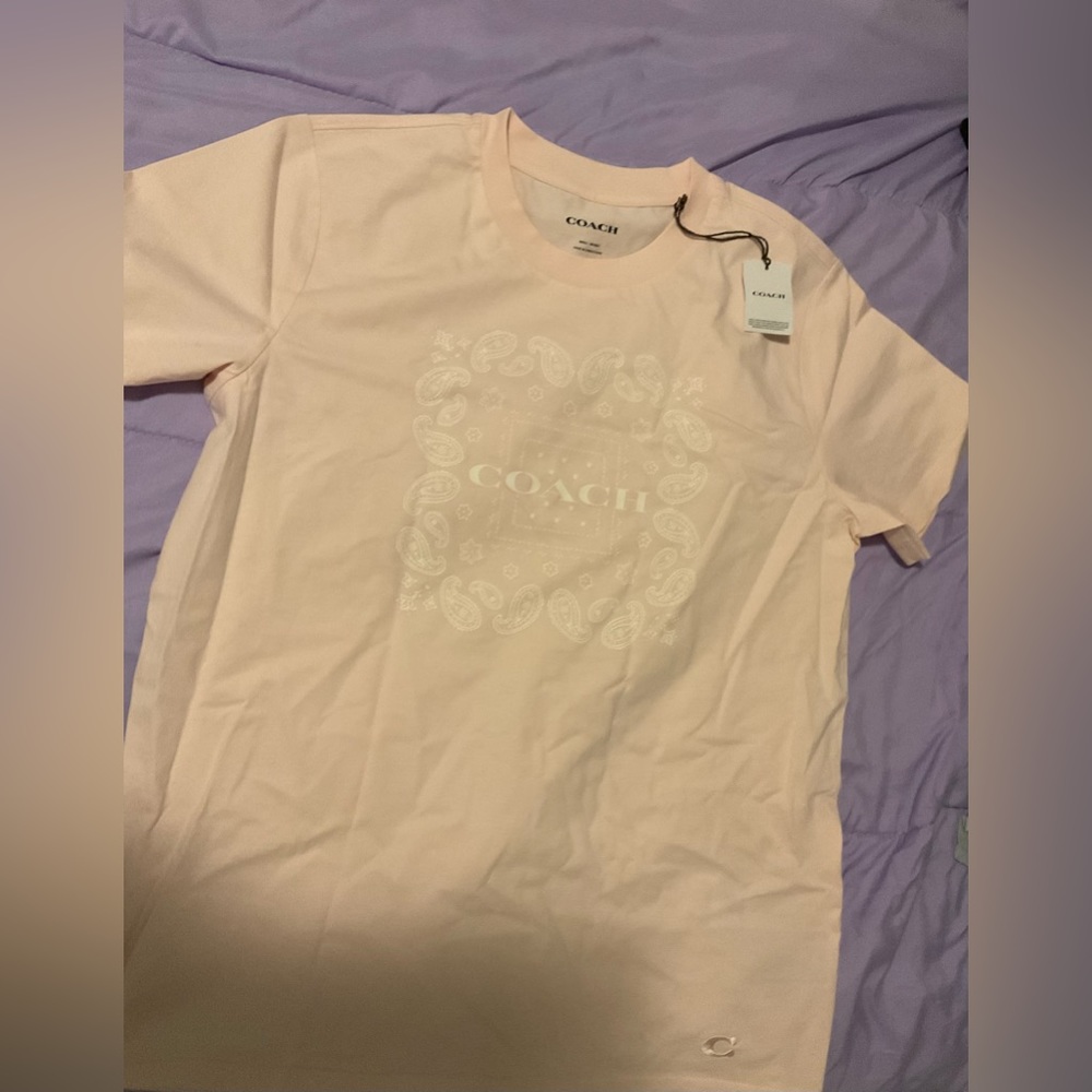 Light pink coach shirt